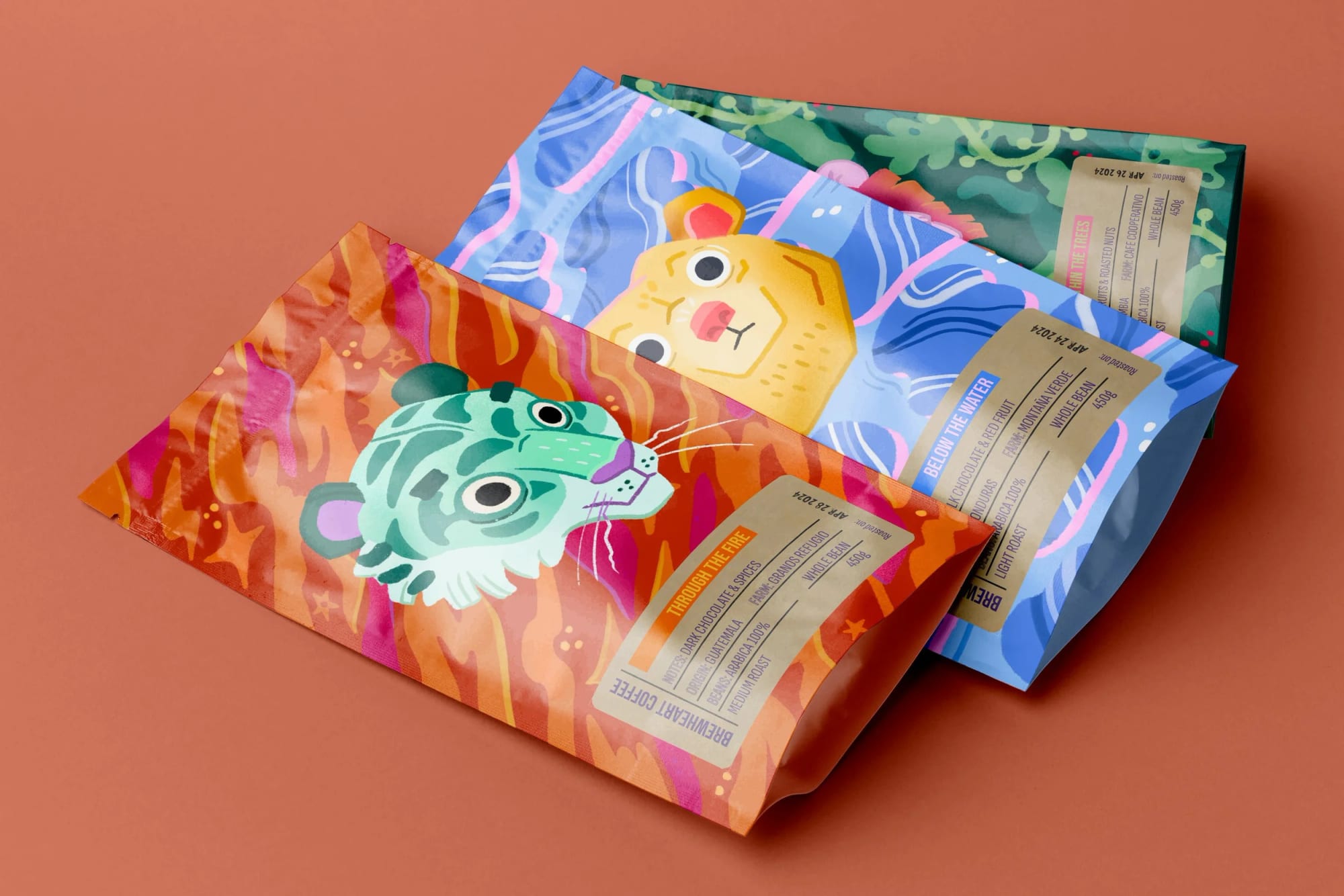 Two colorful snack bags with cartoon animal illustrations, one featuring a tiger and the other a lion, on a pink background.