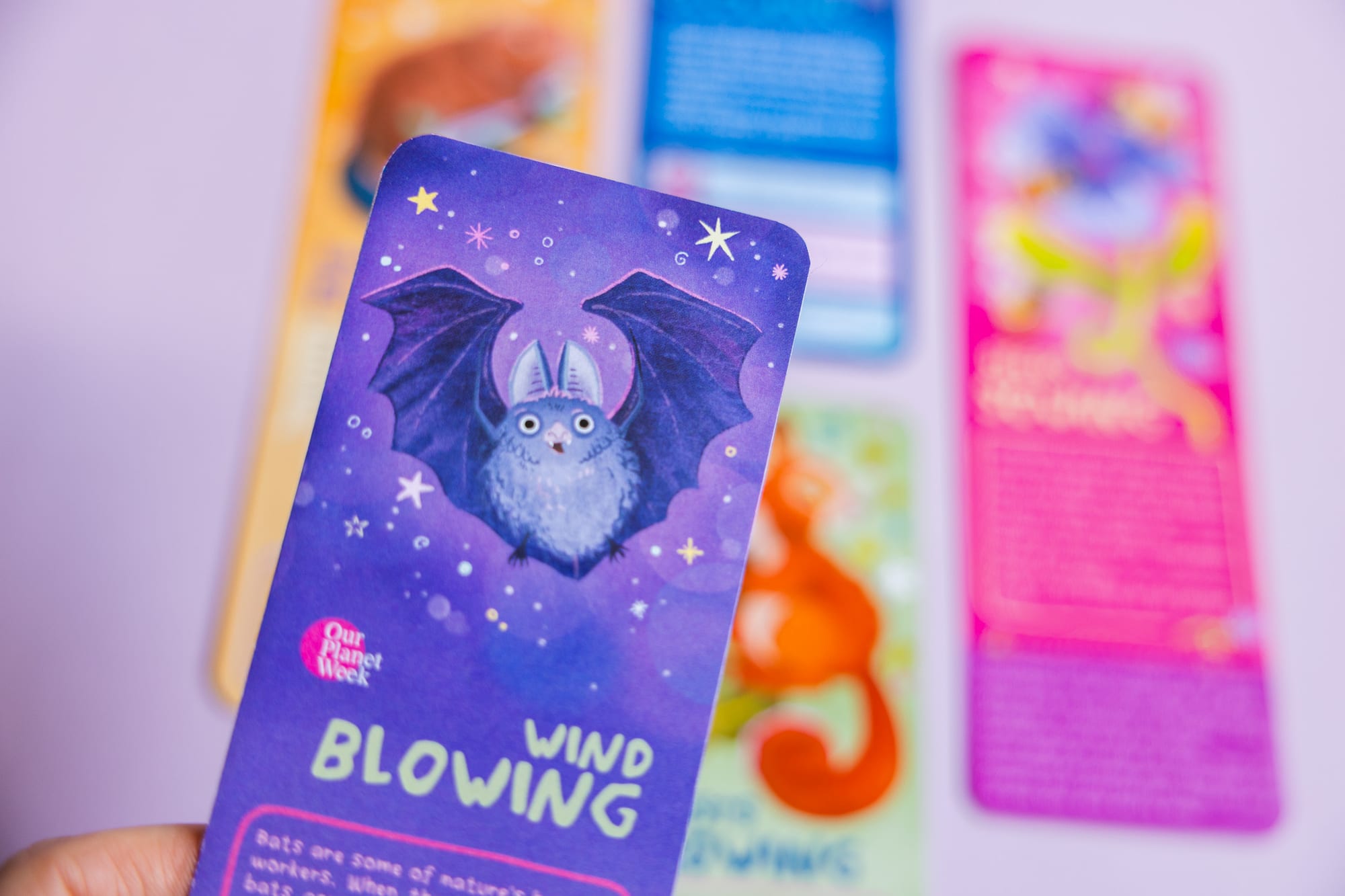 Full set of educational bookmarks fanned out — Forests Growing, Rivers Flowing, Oceans Glowing, Wind Blowing, Seeds Sowing.